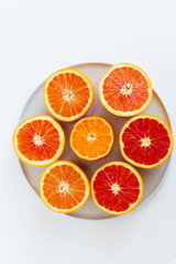 Blood Orange Halves on White Plate
