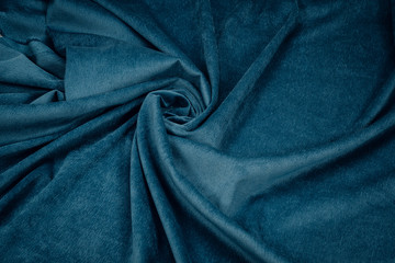 Fototapeta na wymiar The fabric is blue corduroy.