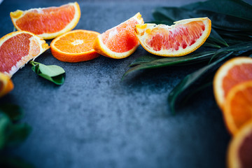 Dark Textured Background With Citrus and Greenery