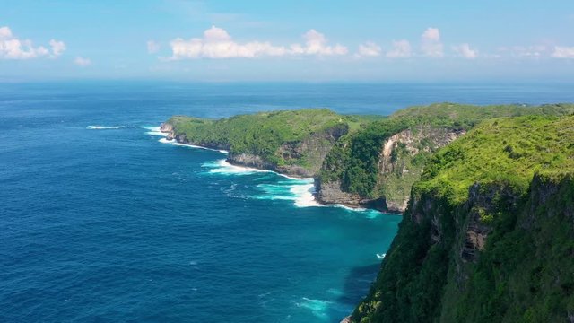 Aerial view at sea and rocks. Turquoise water background from top view. Summer seascape from air. Kelingking beach, Nusa Penida, Bali, Indonesia. Travel - image