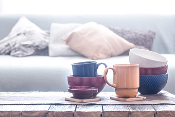 still life interior decor with home utensils on a wooden table