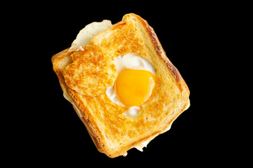 Ham and cheese sandwich with fried egg isolated on black background