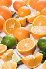 Fresh fruits, juicy slices of orange, lime and lemon.