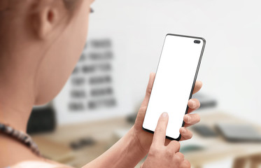 Modern smart phone in woman hand. Woman touch isolated screen. App design promotion concept.
