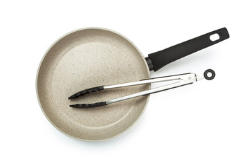 Photo of a bright ceramic pan with a black handle, isolated on a white background.