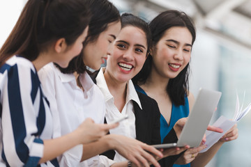 Asian businesswomen group enjoy worker outdoor , Concept business success