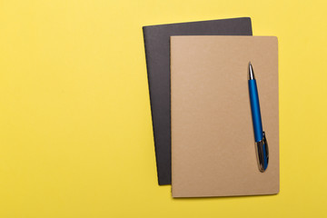 school notebook on a yellow background