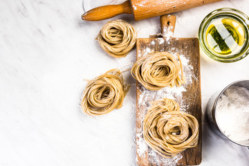 Italian raw uncooked tagliatelle pasta