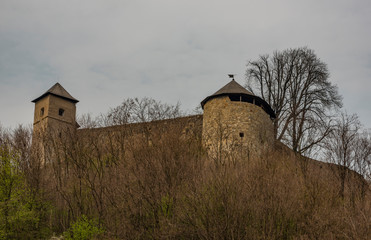 Fototapeta premium Brumov town and castle in east Moravia in spring cloudy day