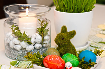 Easter table setting with colorful home decorations