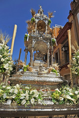 "Paso" of the Custody. Procession of Corpus Christi at the neighborhood of Triana (Corpus Chico), one of the most unique religious celebrations in Seville Spain