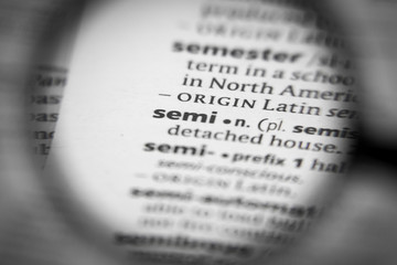 Word or phrase semi in a dictionary.