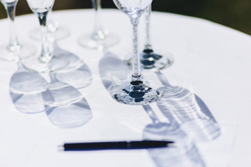dishes on banquet tables, serving glasses, spoons and plates