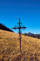 Obraz premium Iron cross in in The Carpathian Mountains