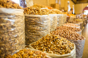 Photo of a bag of walnuts on Tbilisi bazaar for graphic and web design, for website or mobile app.