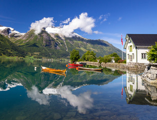 boats on Oppstryn lake in Hjelle in Norway