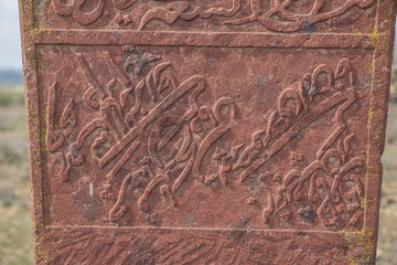 Ancient muslim cemetery near Agstafa, Azerbaijan with writings on farsi for graphic and web design, for website or mobile app.