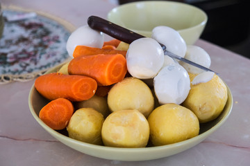 boiled eggs potatoes and carrots on a plate