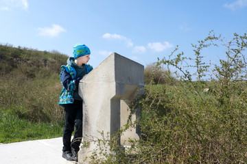 Boy looks at description of sights of Chersonese