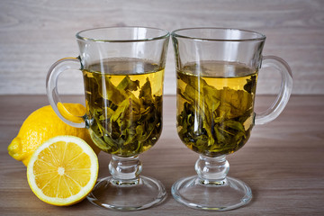 two cups of green tea with lemon 