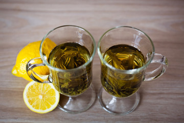 two cups of green tea with lemon 