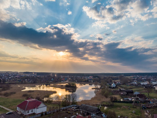 The sunset over Belarussian countryside. Rakov, Belarus. Drone aerial photo