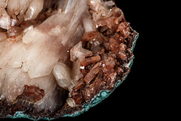 Macro of a stone Albite mineral on a black background