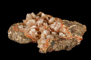 Macro of a stone Stilbite mineral on a black background