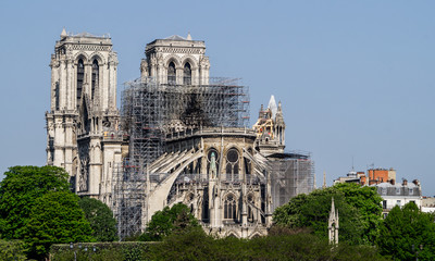 Notre Dam de Paris after fire shot at sunny day in Paris France from a bridge 