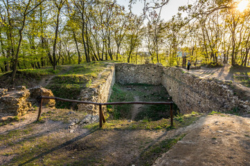 Kunratice forest - beautiful green park with path and ruins of New Castle during sunset in Prague (secret gem, popular travel destination in Czech Republic, Europe)