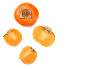 fresh ripe persimmons with slices isolated on white background. top view