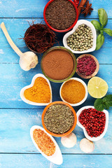 Spices and herbs variation on table. Food and cuisine ingredients.