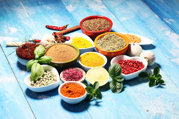 Spices and herbs variation on table. Food and cuisine ingredients.