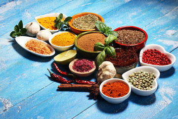 Spices and herbs variation on table. Food and cuisine ingredients.