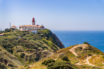 Fototapeta na wymiar Cabo da Roca, Portugal. Lighthouse and cliffs over Atlantic Ocean.