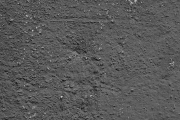 Wall fragment with scratches and cracks