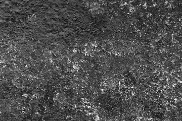 Wall fragment with scratches and cracks