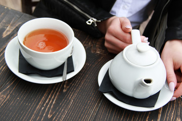 teapot and cup of green tea