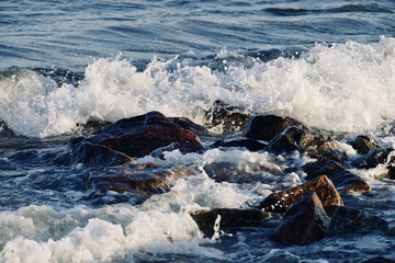 waves crashing on rocks