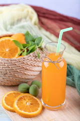Fresh orange juice in the glass jar