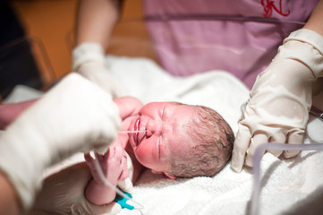 Newborn Baby is Crying at His First Check Up