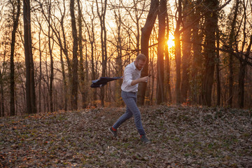one young man carefree dancing while listening to music.