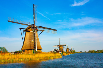 Naklejka premium Windmill at Kinderdijk - beautiful sunny day