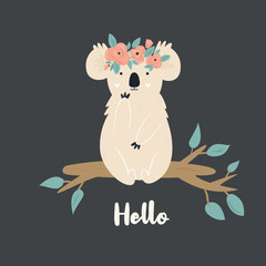 Funny cute koala in floral wreath.