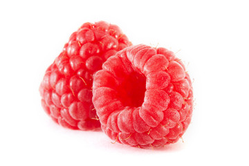 Ripe red fresh raspberries isolated on white background. top view. Raspberry group closeup macro