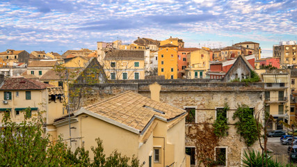 Fototapeta na wymiar City skyline of Corfu, Greece shows the weathered buildings of old town
