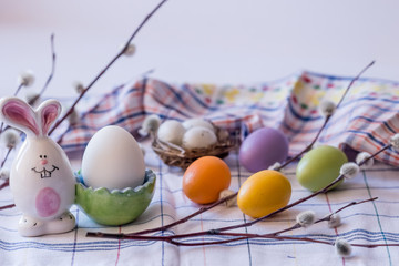 Easter composition: eggs and porcelain figurines