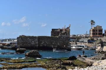Fototapeta na wymiar view of the tower at the antic harbor of Byblos, Jbeil, Lebanon