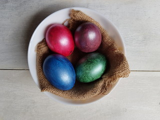 eggs colorful easter white wooden background