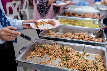 Food Buffet Catering Dining Eating Party Sharing Concept.people group catering buffet food indoor in luxury restaurant with meat colorful fruits and vegetables